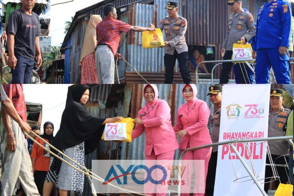Polres Indragiri Hilir Salurkan 200 Paket Sembako kepada Warga Pesisir Sungai Indragiri dalam Rangka Hari Bhayangkara ke-79