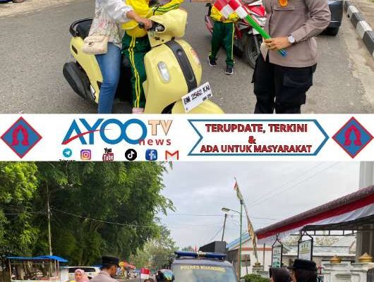 Sat Binmas Polres Kuansing Bagikan Bendera Merah Putih Untuk Tanamkan Semangat Nasionalisme Sejak Usia Dini